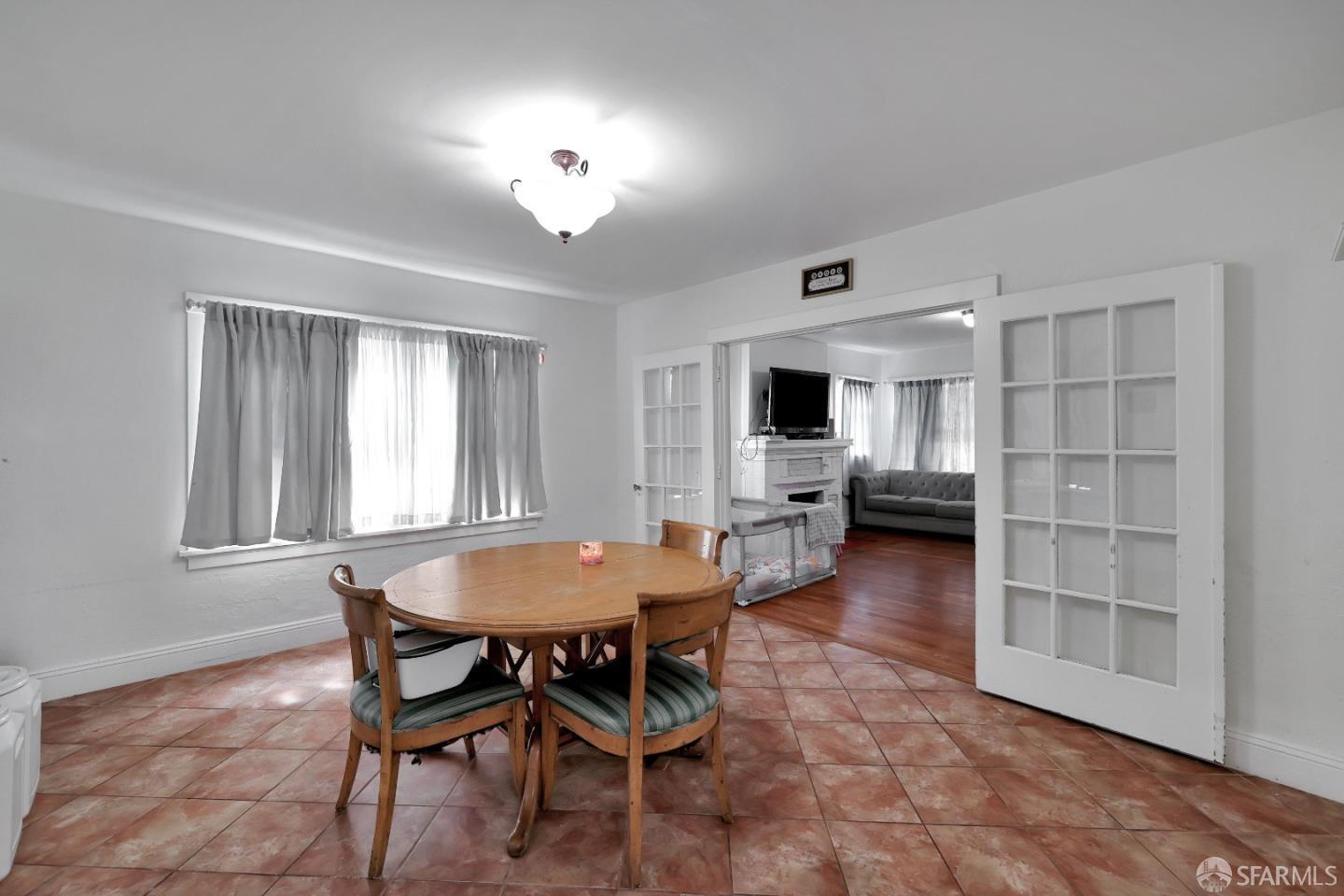 609 South Delaware Street San Mateo, CA 94402 - Photo 12 of 22 a view of a dining room with furniture and wooden floor