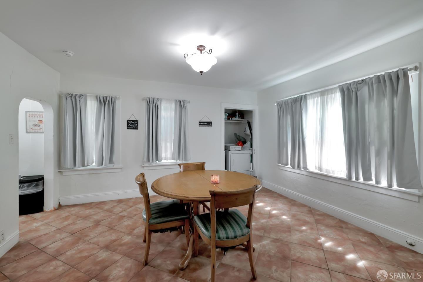 609 South Delaware Street San Mateo, CA 94402 - Photo 14 of 22 a dining room with furniture and window