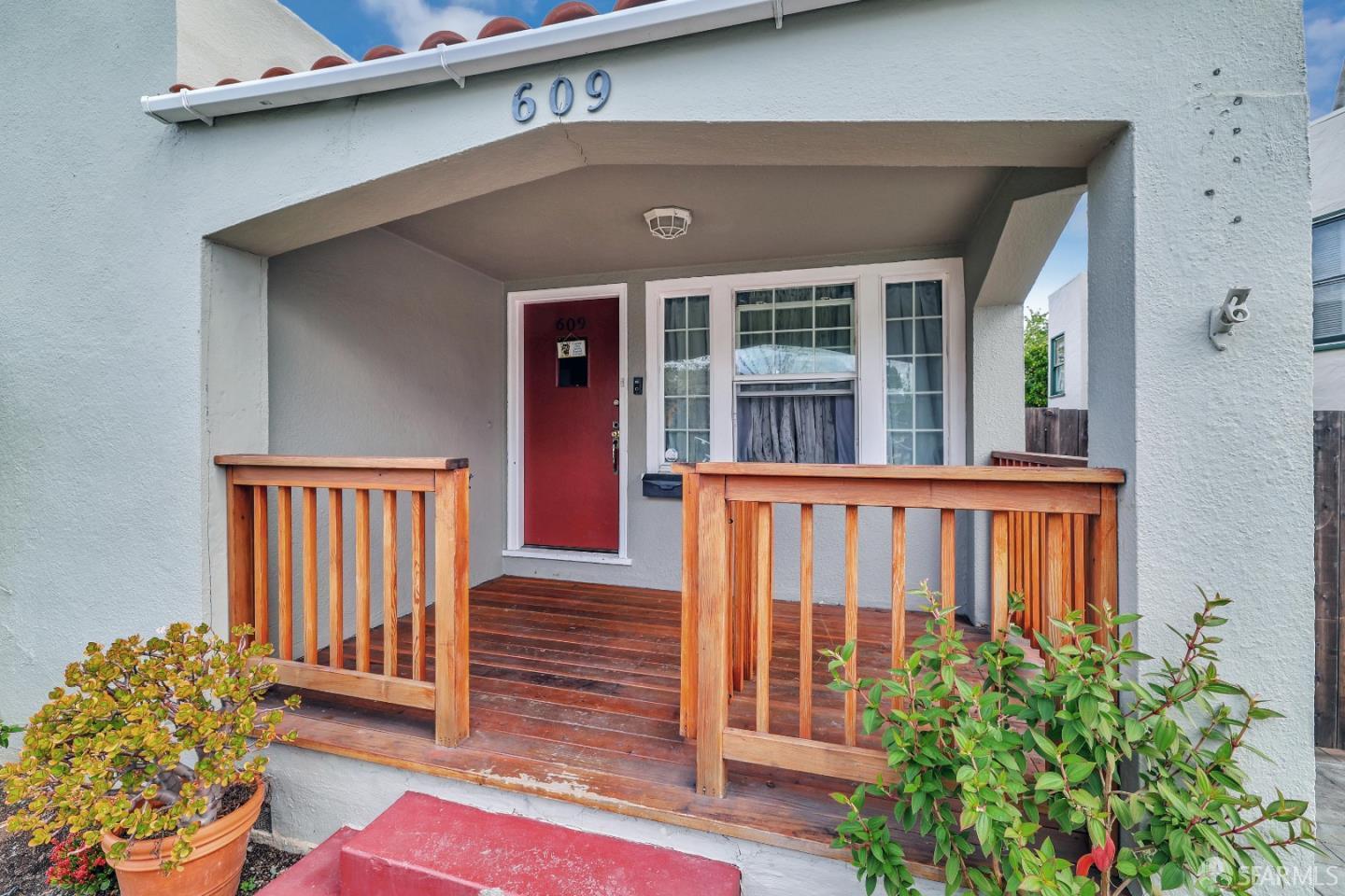 609 South Delaware Street San Mateo, CA 94402 - Photo 6 of 22 a front view of a house with a garden