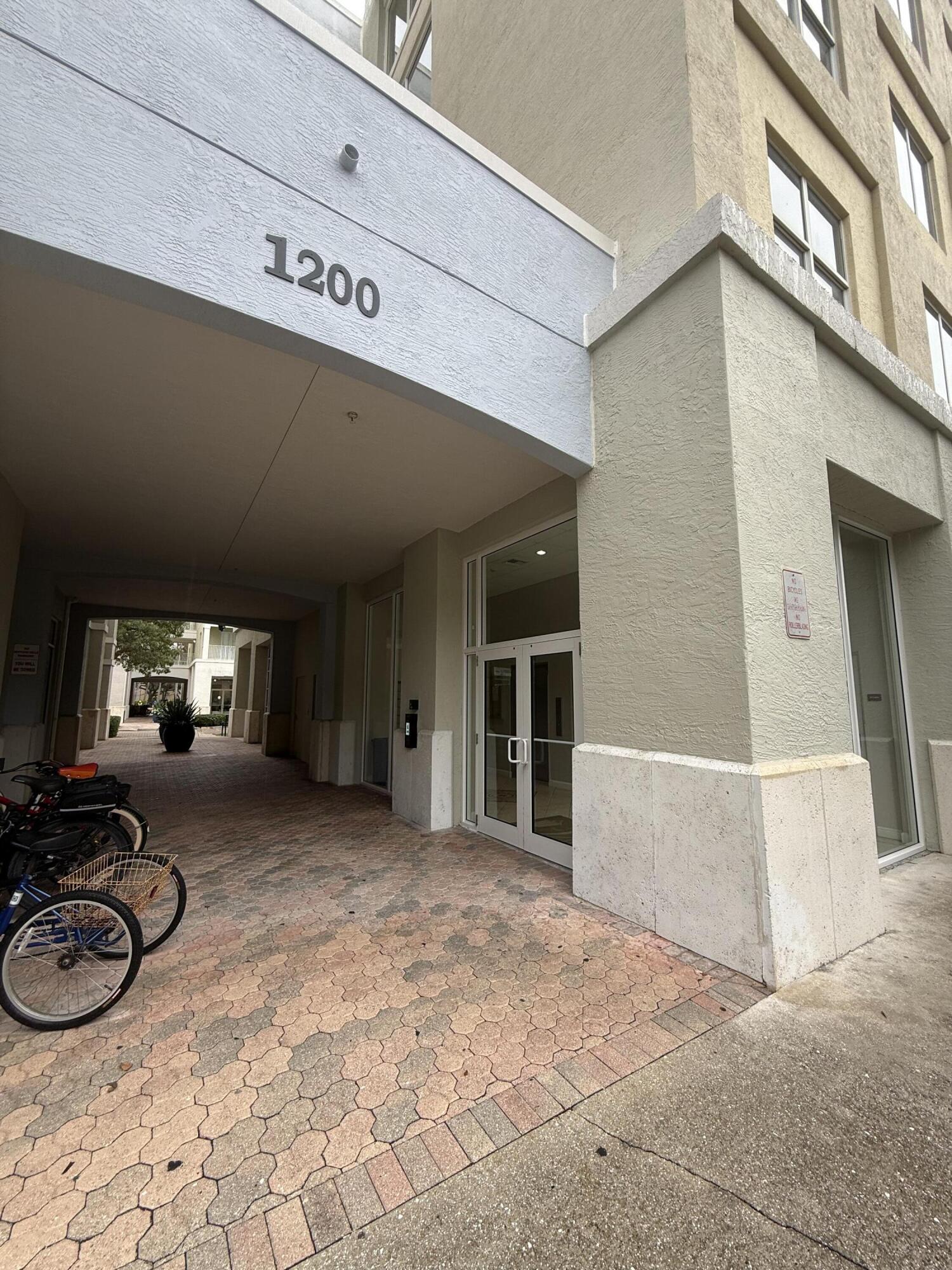 1200 Town Center Drive, Unit 206 Jupiter, FL 33458 - Photo 23 of 24 a view of a room with gym equipment