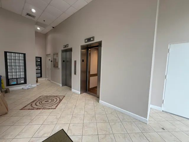 a view of a hallway with some storage area