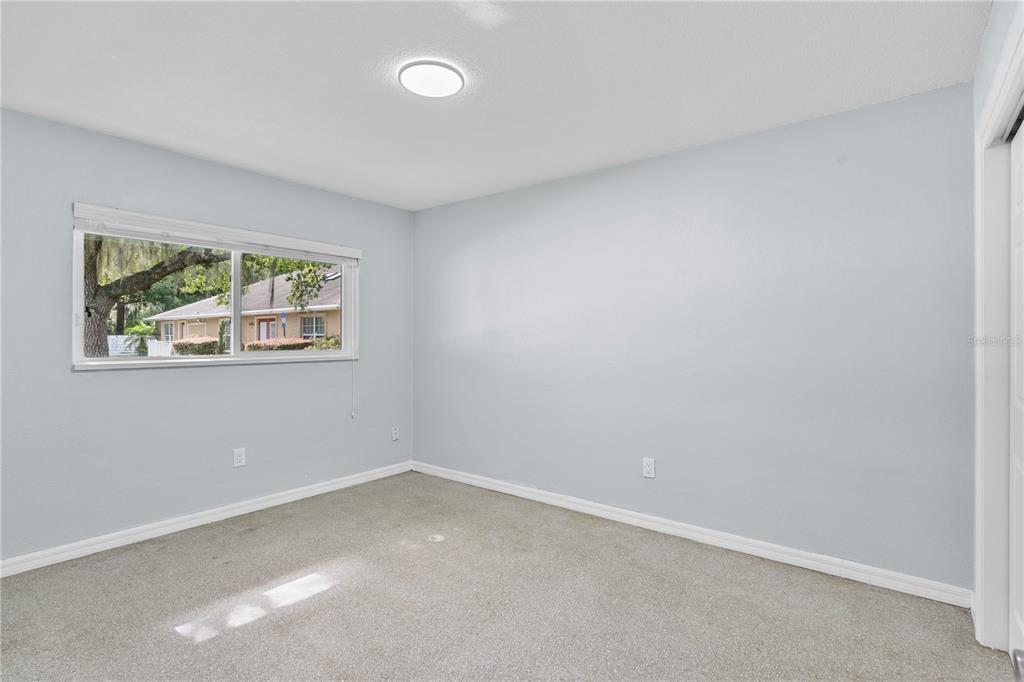 11987 Maple Street, Unit 1 Dunnellon, FL 34432 - Photo 15 of 25 an empty room with a window