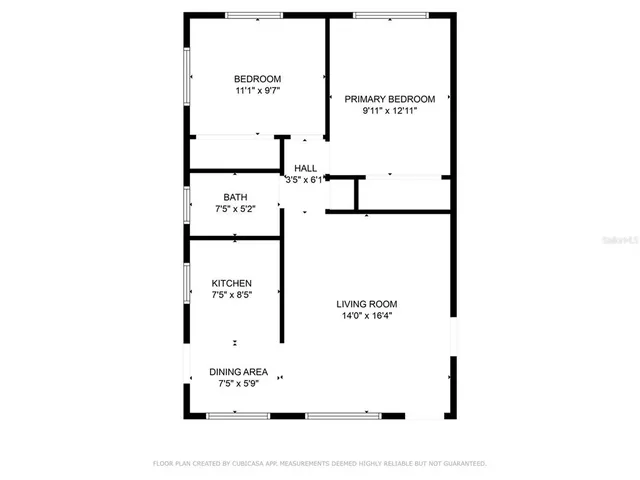 a picture of a bench in front of a wall