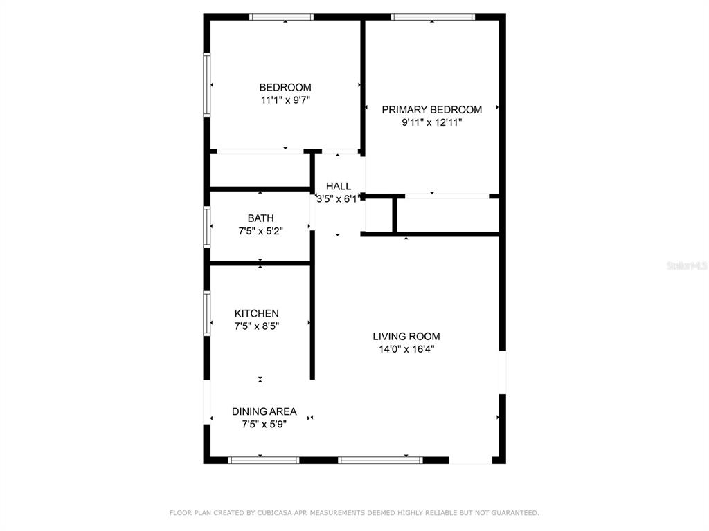 11987 Maple Street, Unit 1 Dunnellon, FL 34432 - Photo 25 of 25 a picture of a bench in front of a wall