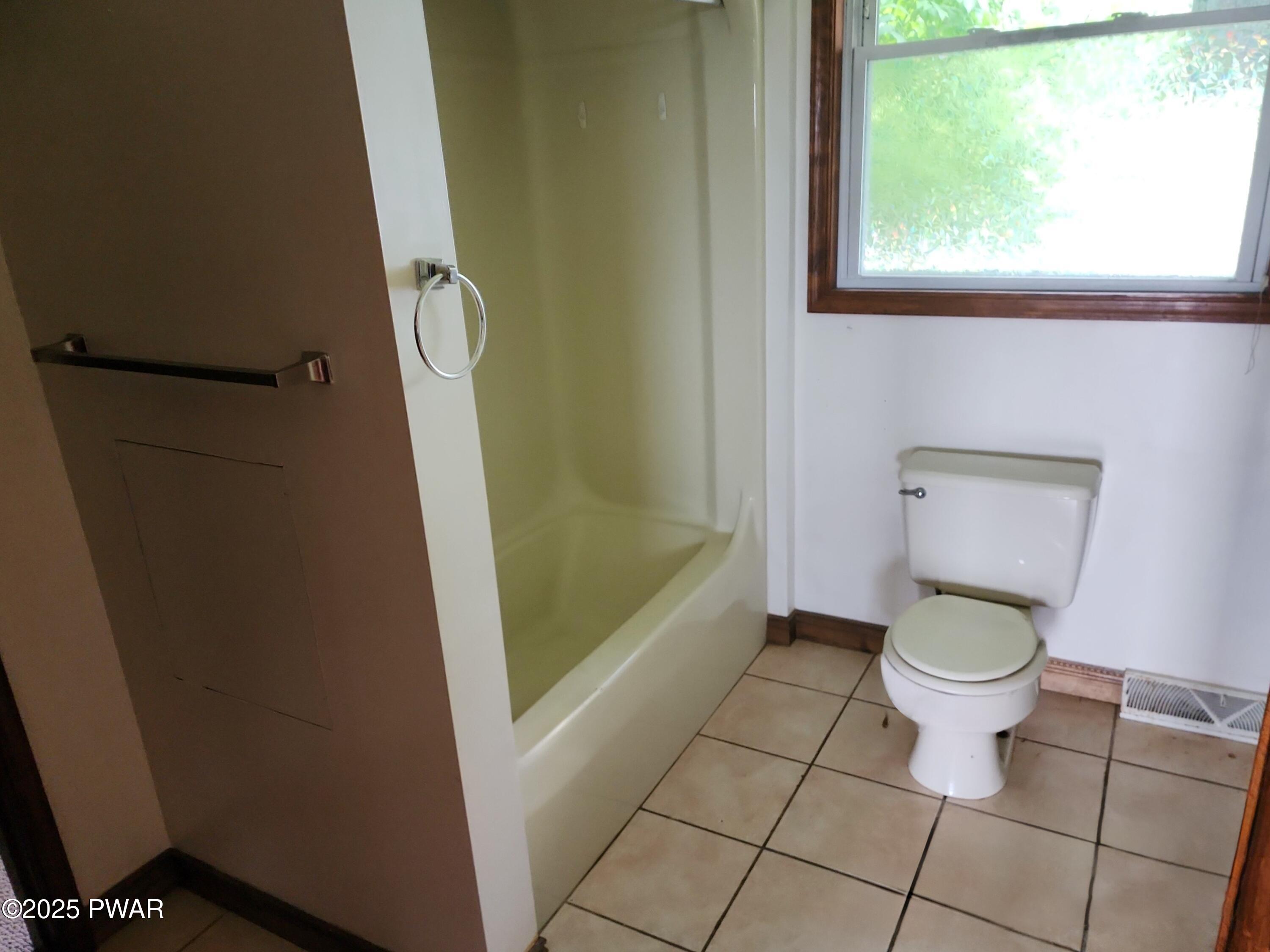 961 Aberdeen Road Moscow, PA 18444 - Photo 12 of 26 a bathroom with a toilet and a shower