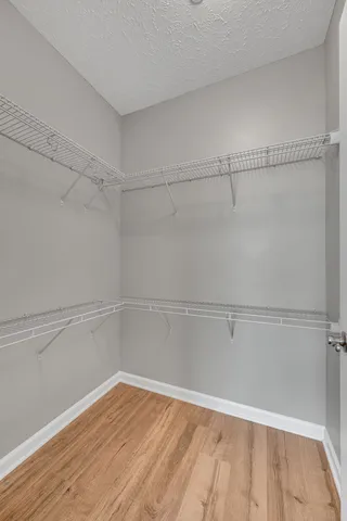 a view of a room with racks on the wall