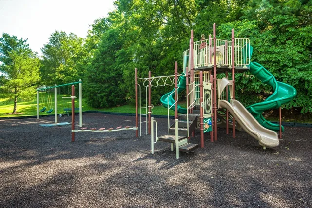 a view of outdoor space with wooden deck and outdoor seating