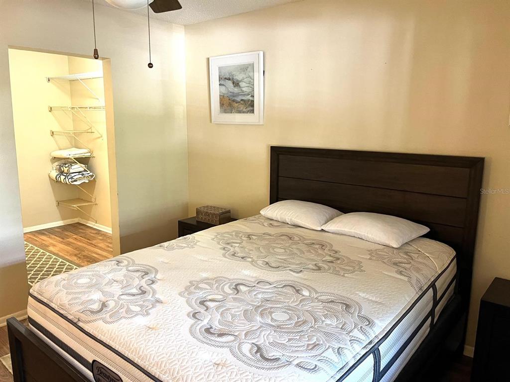 1550 South Belcher Road, Unit 524 Clearwater, FL 33764 - Photo 17 of 45 a bedroom with a bed and bathroom