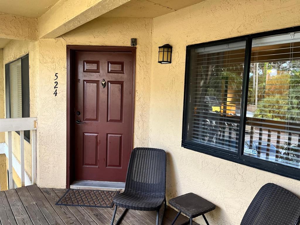 1550 South Belcher Road, Unit 524 Clearwater, FL 33764 - Photo 27 of 45 a front view of a house with glass windows