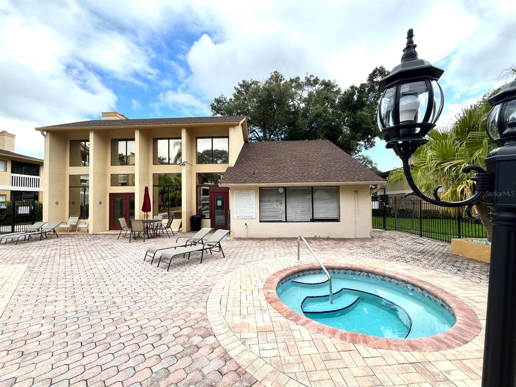 1550 South Belcher Road, Unit 524 Clearwater, FL 33764 - Photo 33 of 45 a front view of a house with garden