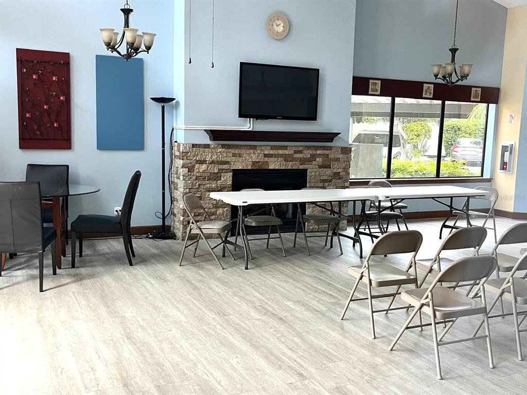 1550 South Belcher Road, Unit 524 Clearwater, FL 33764 - Photo 41 of 45 a view of a dining room with furniture window and wooden floor