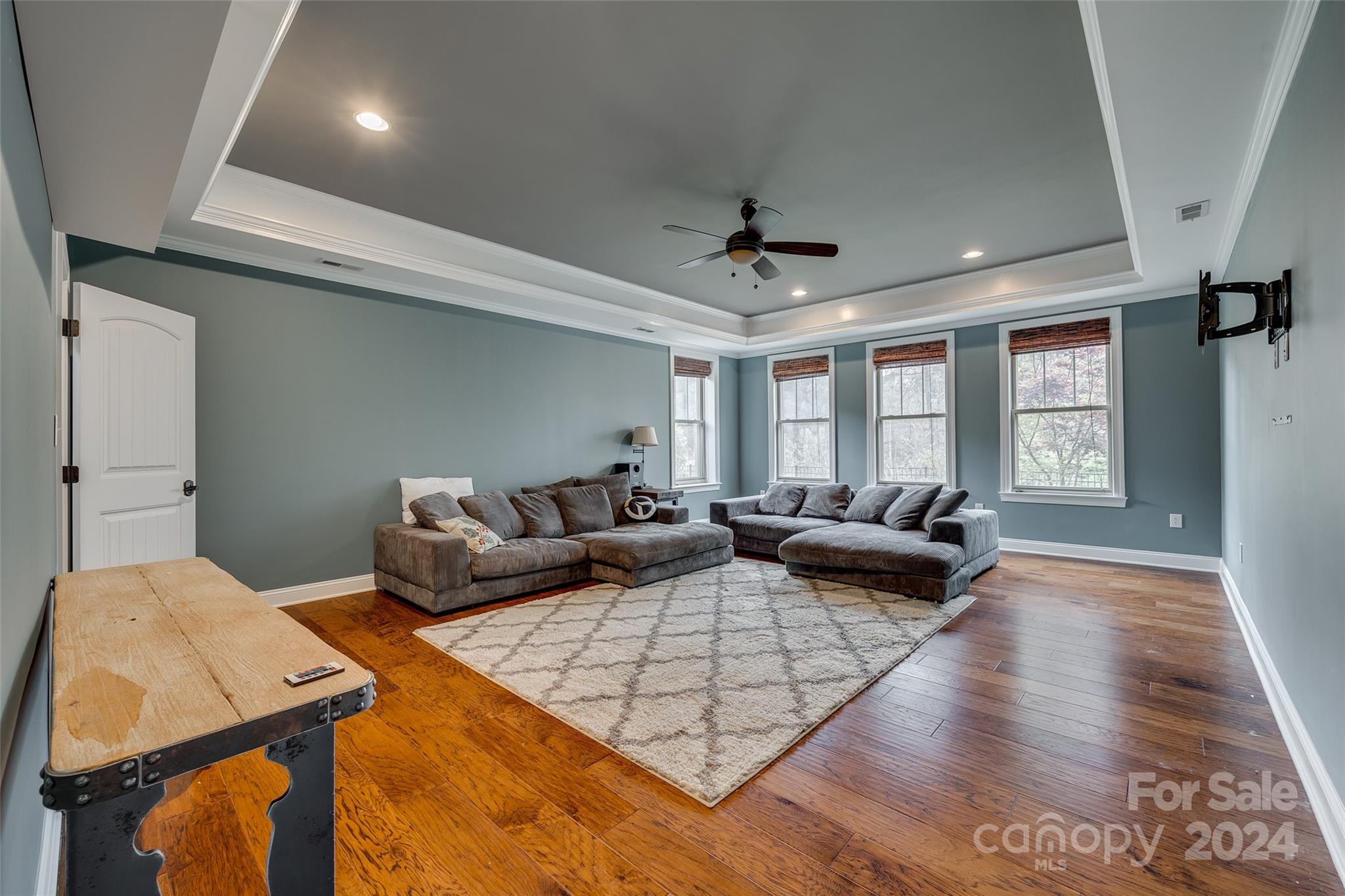 620 Pomegranate Place Fort Mill, SC 29708 - Photo 28 of 48 a living room with furniture and a wooden floor