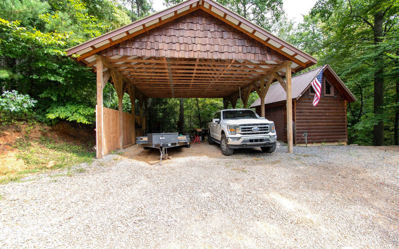 220 Bryant Farm Road Murphy, NC 28906 - Photo 4 of 52 a view of a patio with a table and chairs