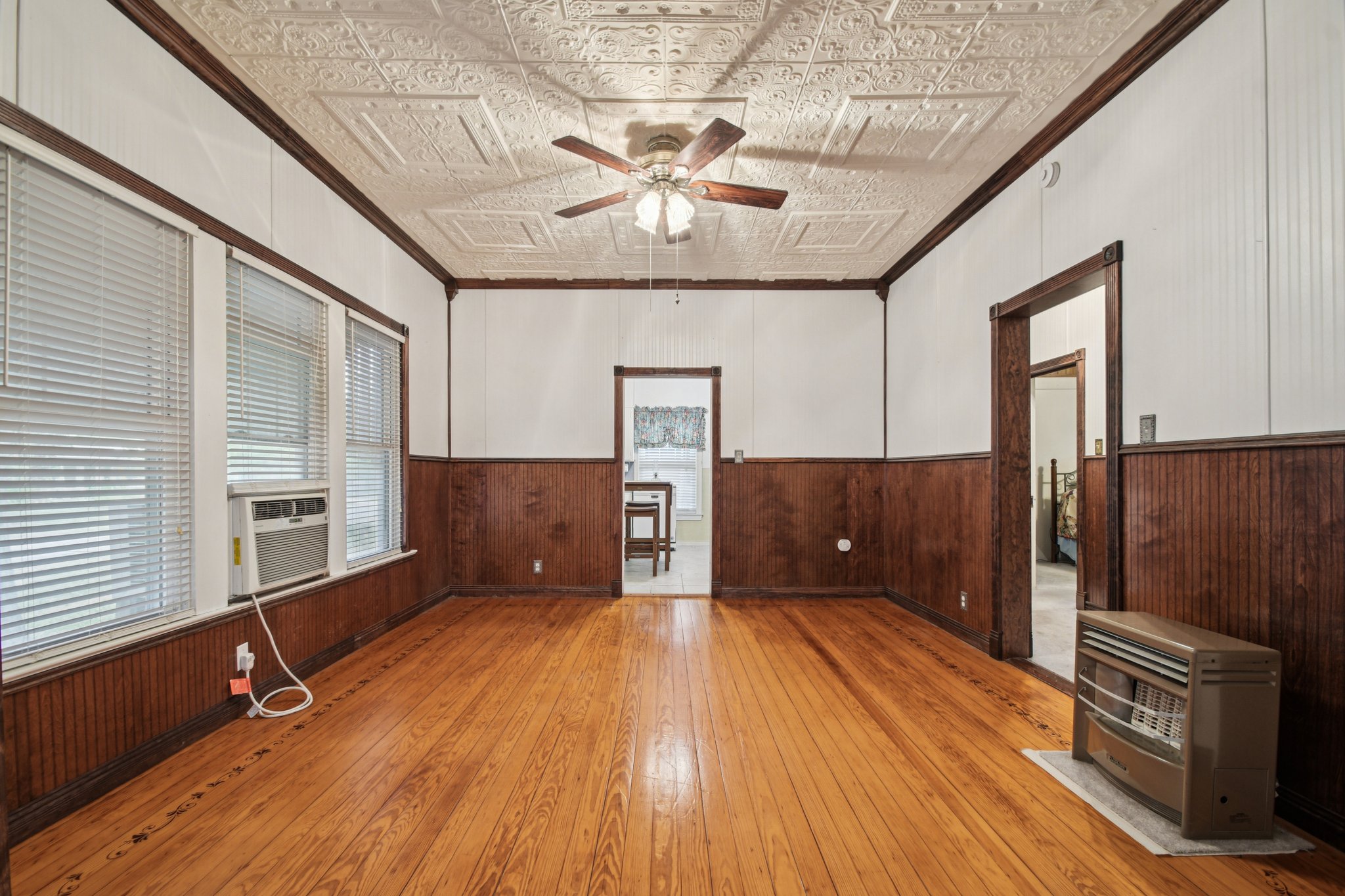 611 North Main Street Elgin, TX 78621 - Photo 14 of 26 a living room with stainless steel appliances wooden floors and large window