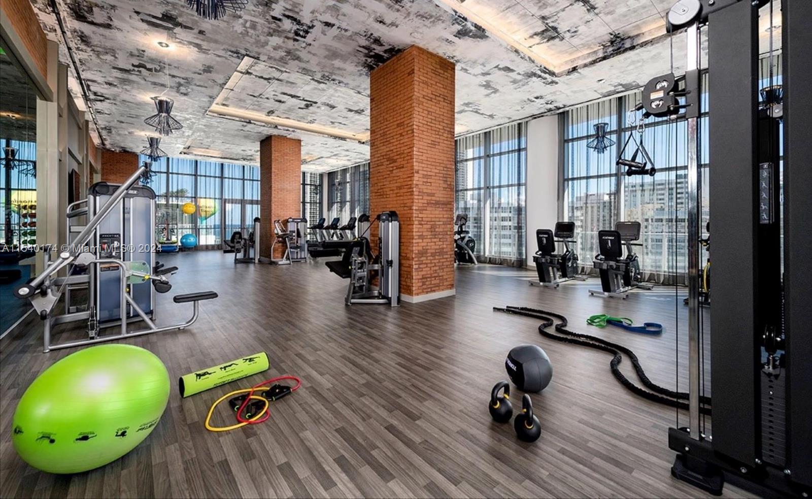 4010 South Ocean Drive, Unit R703 Hollywood, FL 33019 - Photo 19 of 37 a view of a room with gym equipment