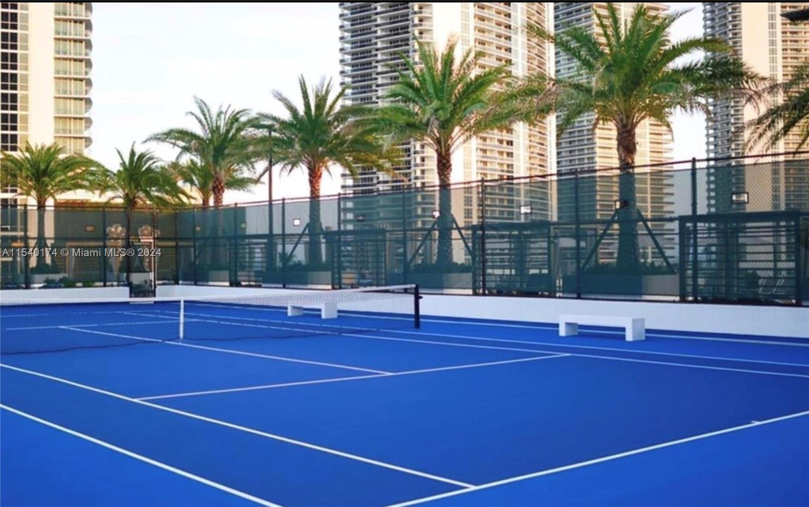 4010 South Ocean Drive, Unit R703 Hollywood, FL 33019 - Photo 28 of 37 a view of a tennis court