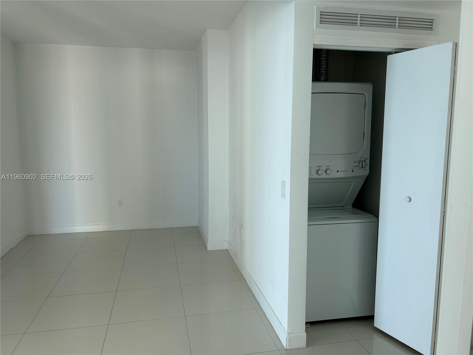 460 Northeast 28th Street, Unit 2401 Miami, FL 33137 - Photo 13 of 31 Den next to laundry closet.