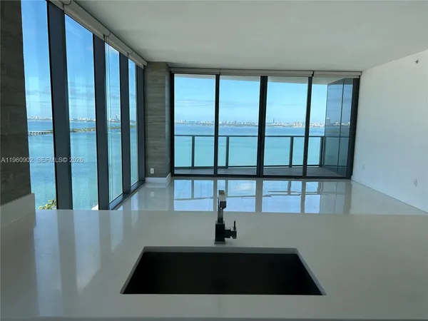 a view of a living room and front door