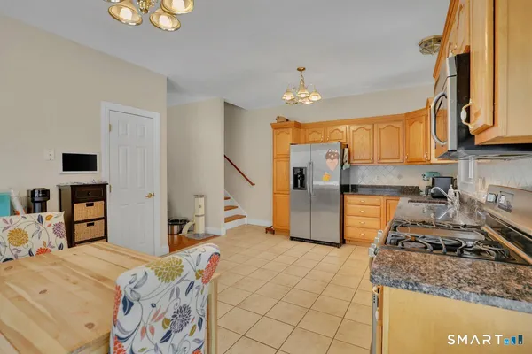 a bed room with a bed furniture and a window