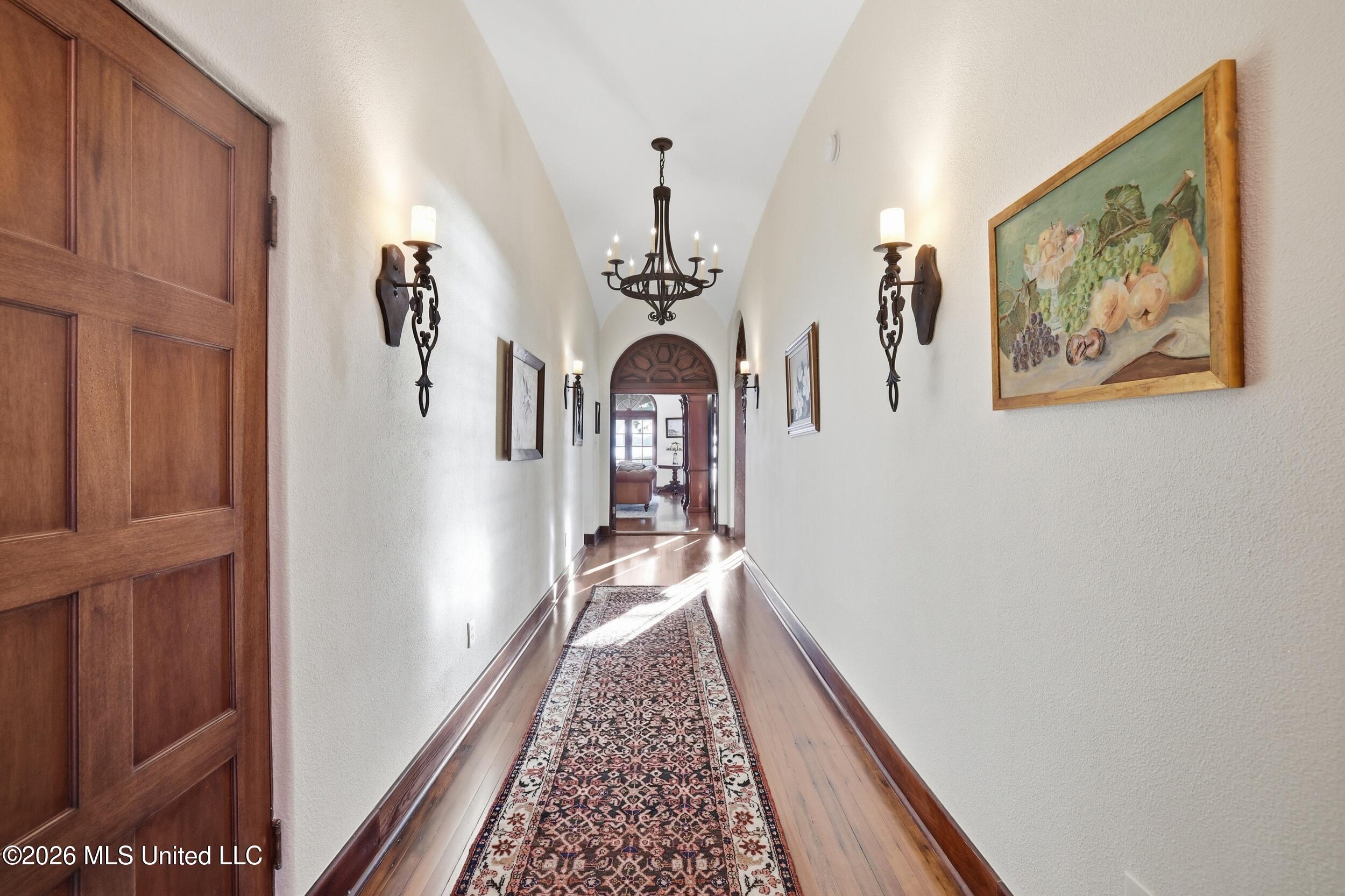 13801 Arbor Circle Ocean Springs, MS 39564 - Photo 12 of 95 HALLWAY FROM ENTERANCE INTO HOME