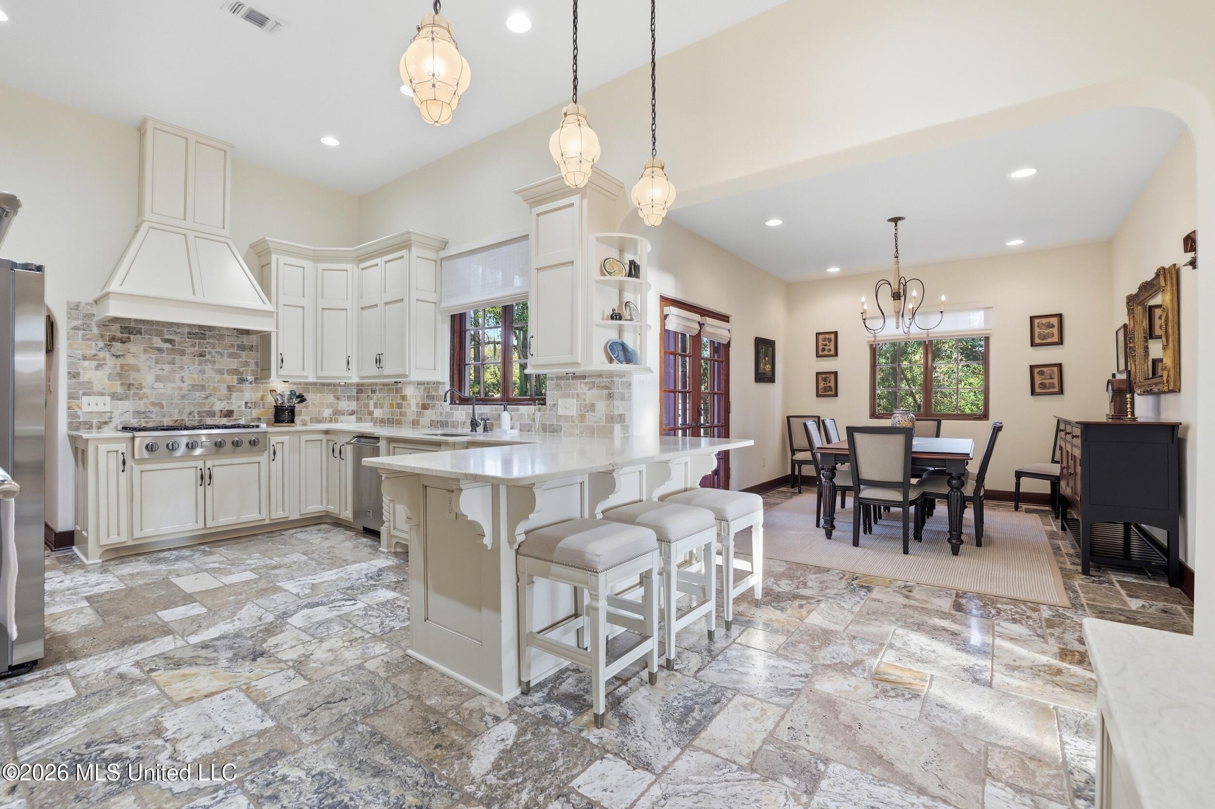 13801 Arbor Circle Ocean Springs, MS 39564 - Photo 14 of 95 KITCHEN LOOKING INTO MORING ROOM