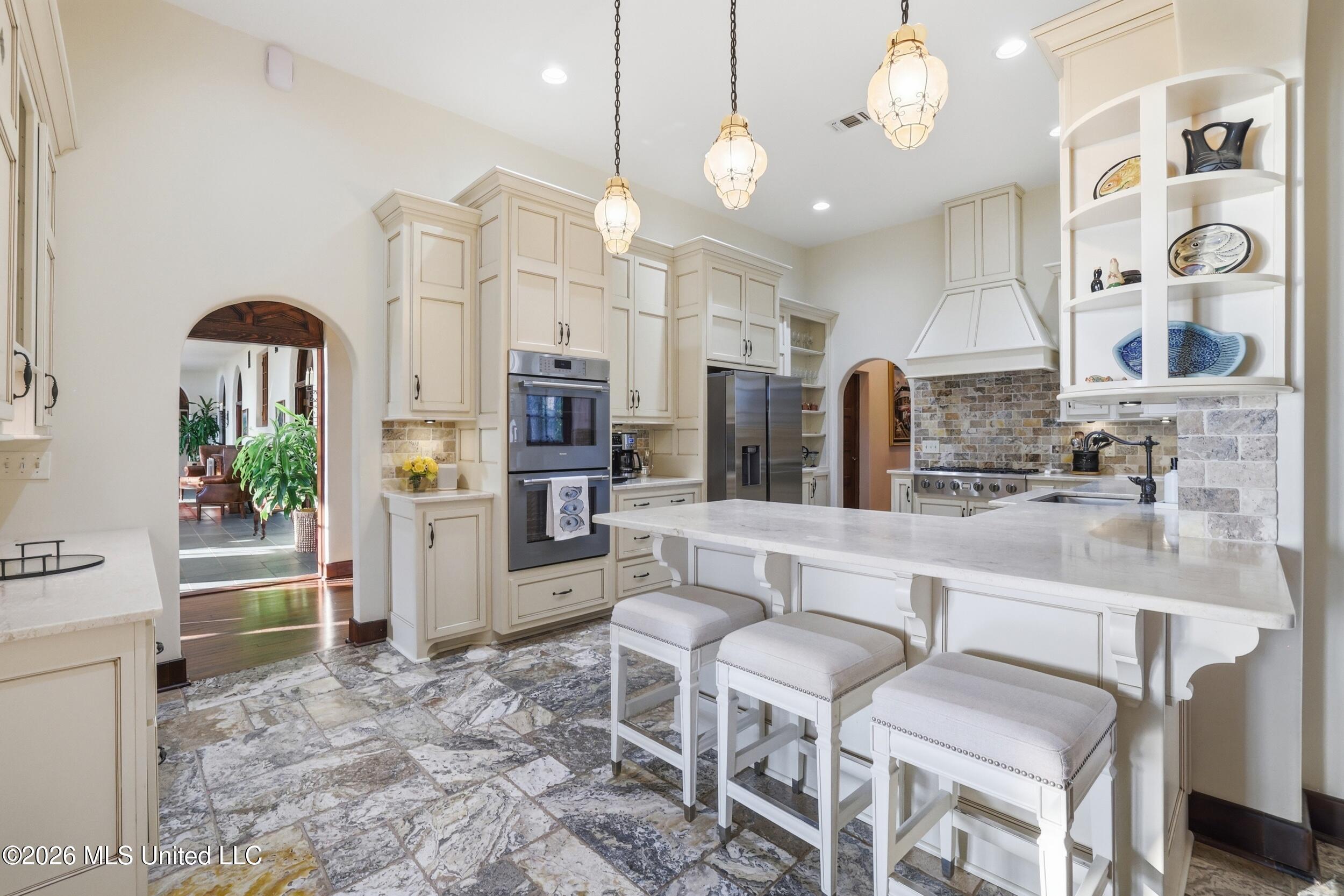 13801 Arbor Circle Ocean Springs, MS 39564 - Photo 16 of 95 KITCHEN ENTERTAINING AREA