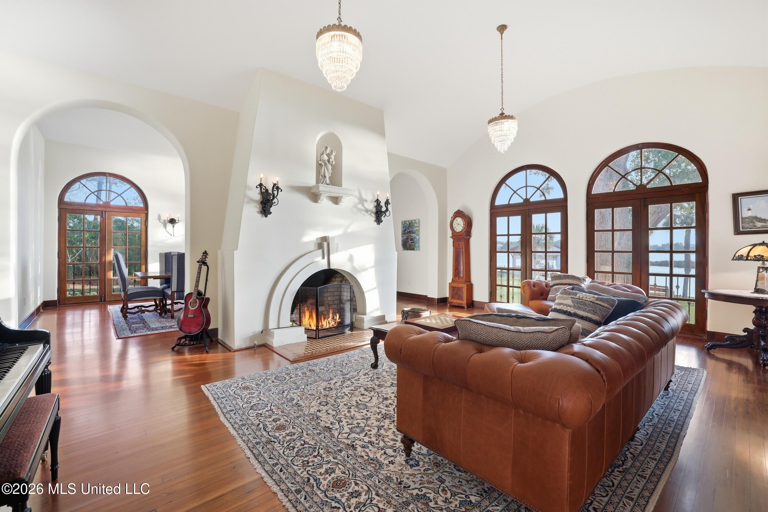 13801 Arbor Circle Ocean Springs, MS 39564 - Photo 24 of 95 FORMAL DEN AND LOVELY FIREPLACE