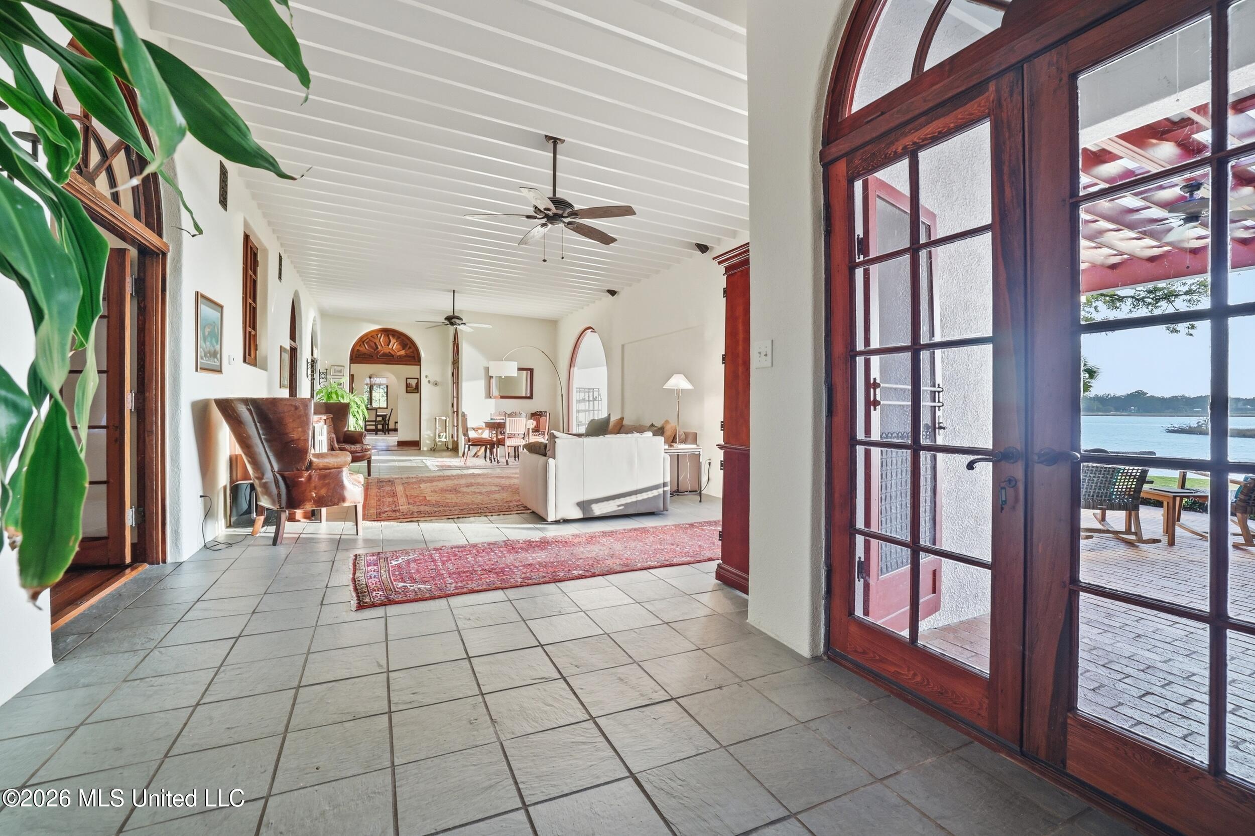 13801 Arbor Circle Ocean Springs, MS 39564 - Photo 44 of 95 VIEW OF DEN FROM WEST SIDE OF ROOM