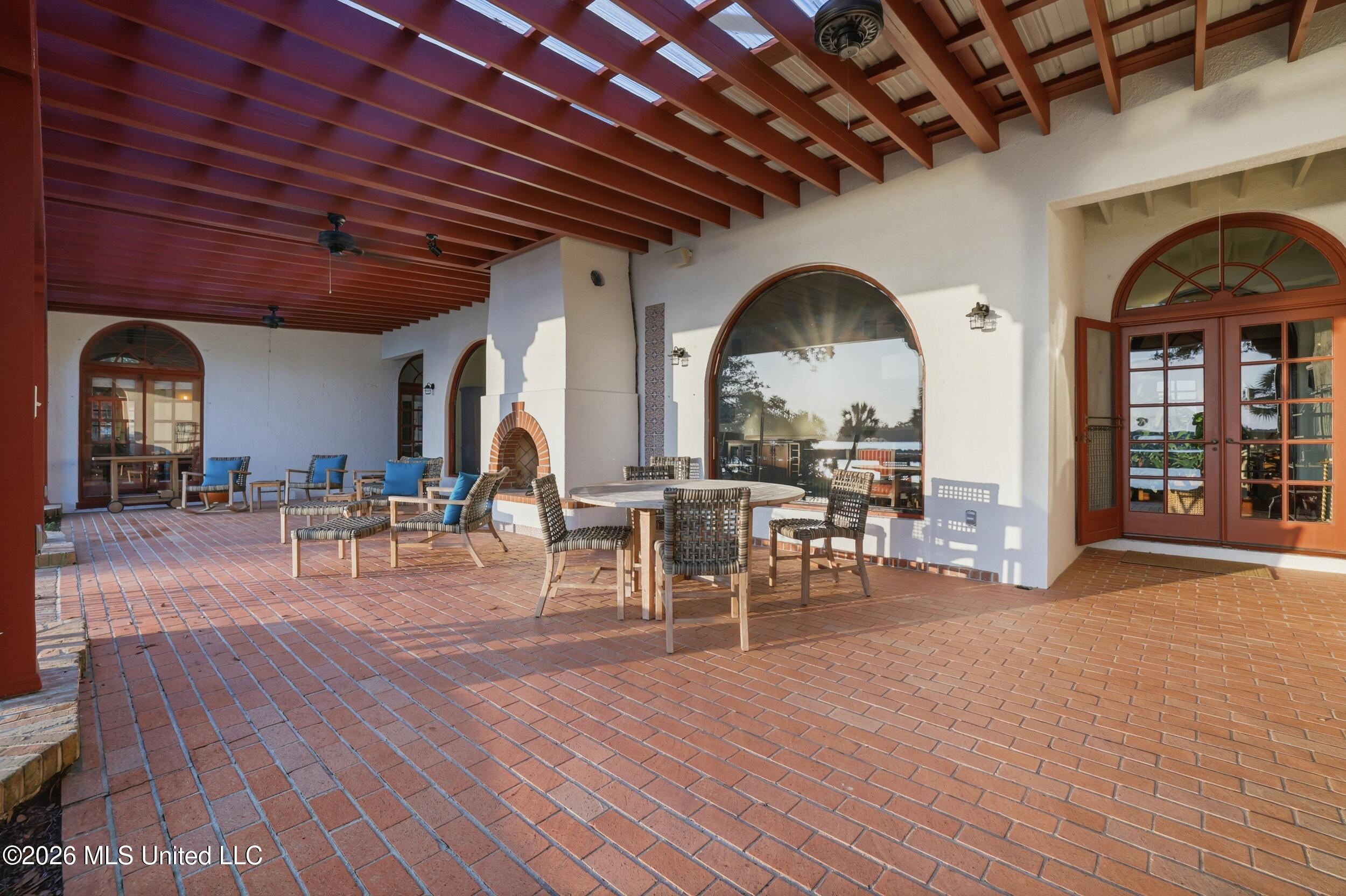 13801 Arbor Circle Ocean Springs, MS 39564 - Photo 75 of 95 VERANDA AND OUTDOOR FIREPLACE
