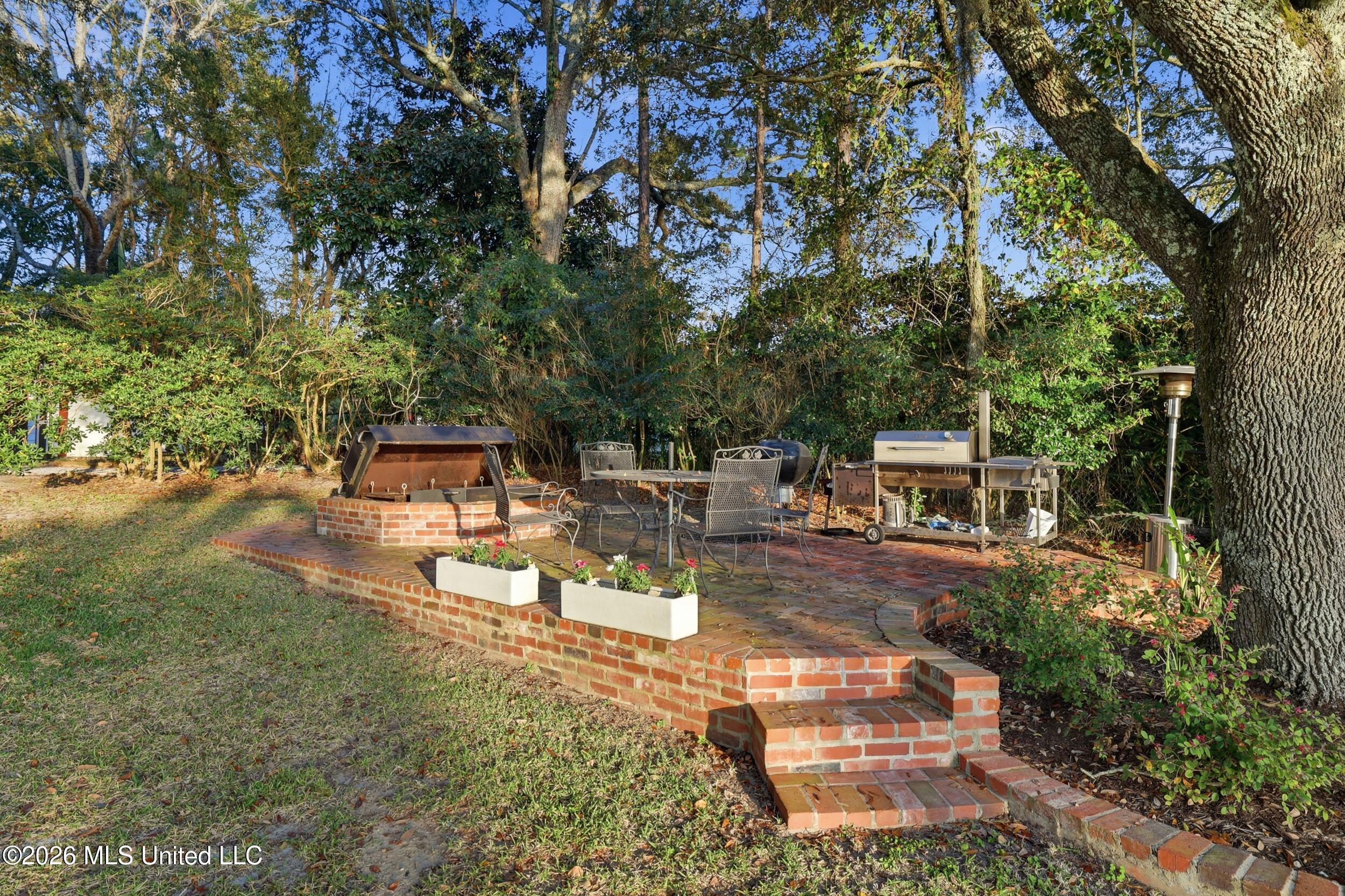 13801 Arbor Circle Ocean Springs, MS 39564 - Photo 90 of 95 OUTSIDE FIRE PIT AND DECK