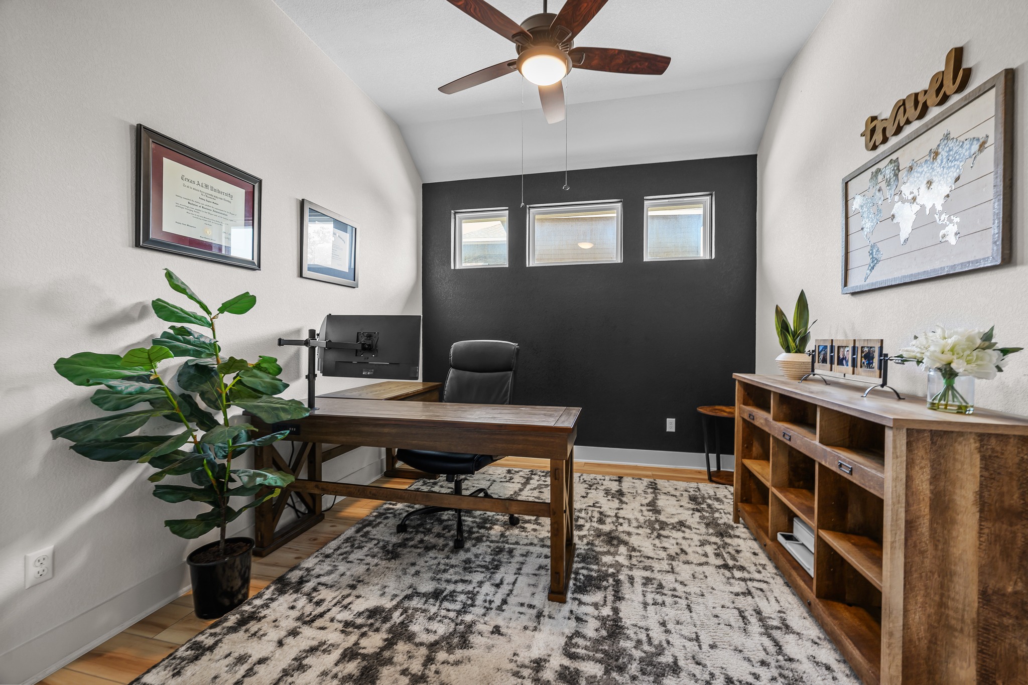 68 Rancho Trail Georgetown, TX 78628 - Photo 13 of 39 A refined home office space with vaulted ceilings provides an ideal environment for productivity.