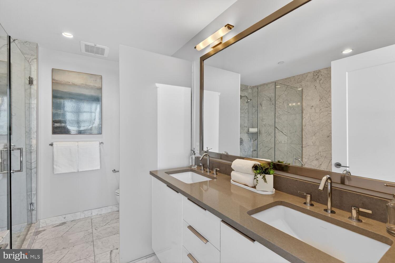 45 Sutton Square Southwest, Unit 1118 Washington, DC 20024 - Photo 29 of 65 Spacious & luxurious marble Primary Ensuite bath