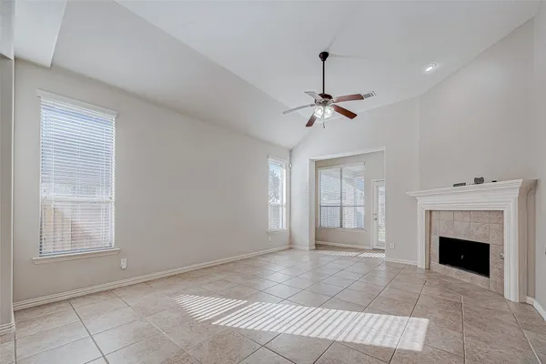 a kitchen with stainless steel appliances granite countertop a sink and dishwasher a stove top oven with wooden floor