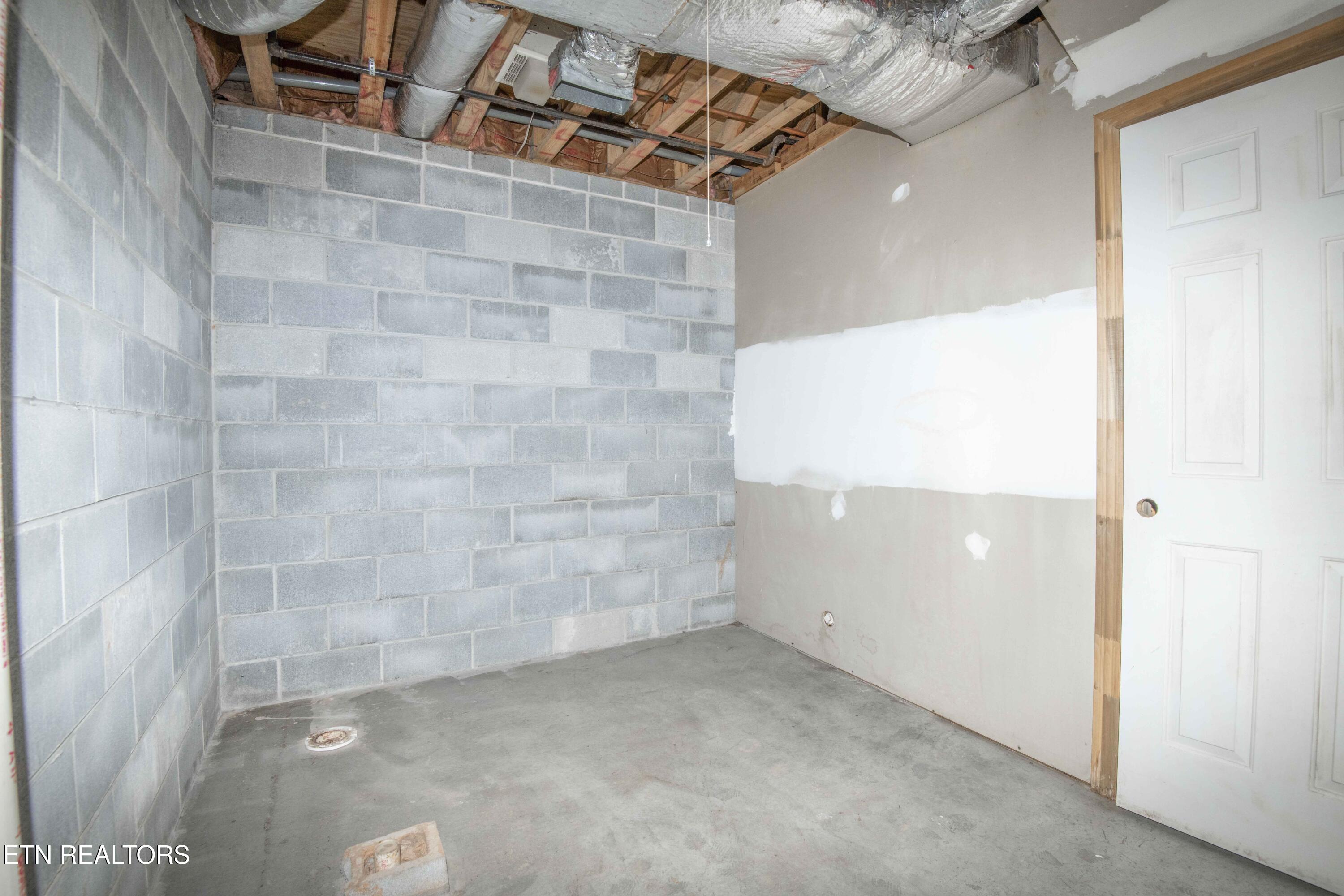197 Whippoorwill Drive Oak Ridge, TN 37830 - Photo 23 of 40 UNFINISHED BASEMENT