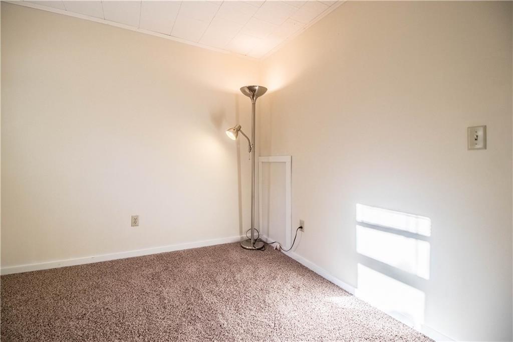 402 Shaker Road Gray, ME 04039 - Photo 13 of 22 Bedroom 2. The door behind the lamp...
