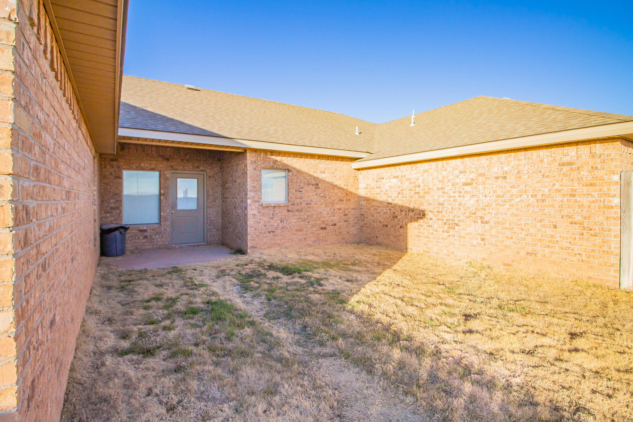2615 113th Street Lubbock, TX 79423 - Photo 15 of 15 a view of a back yard with an empty space