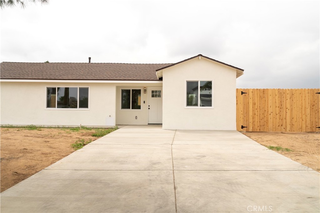 9426 Indiana Avenue Riverside, CA 92503 - Photo 3 of 26 Driveway, Side Fence Access & Front of Home