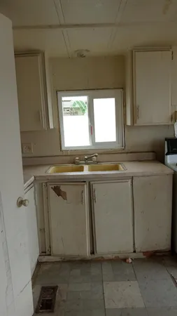a view of a kitchen with washer and dryer