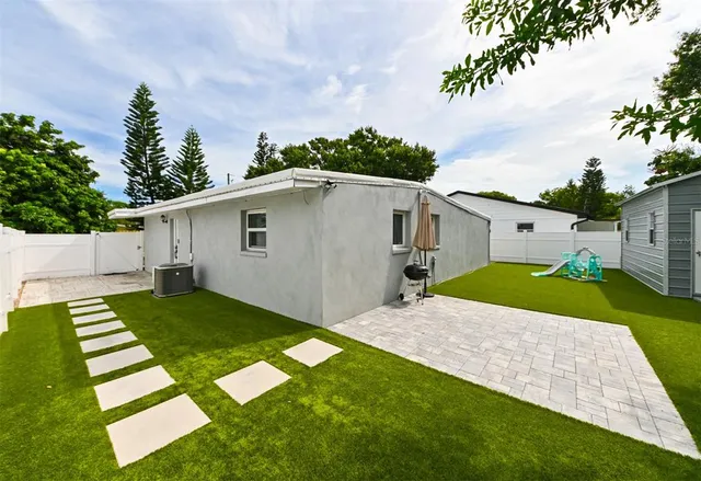 a view of a backyard with a garden