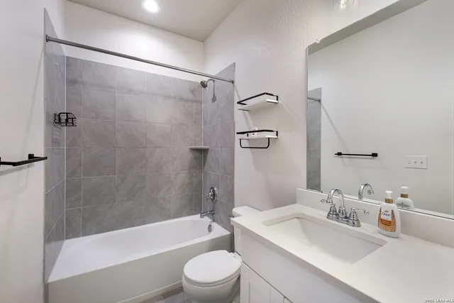 a view of a backyard with a lake view