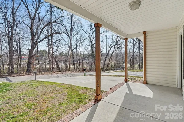 a view of a backyard of the house