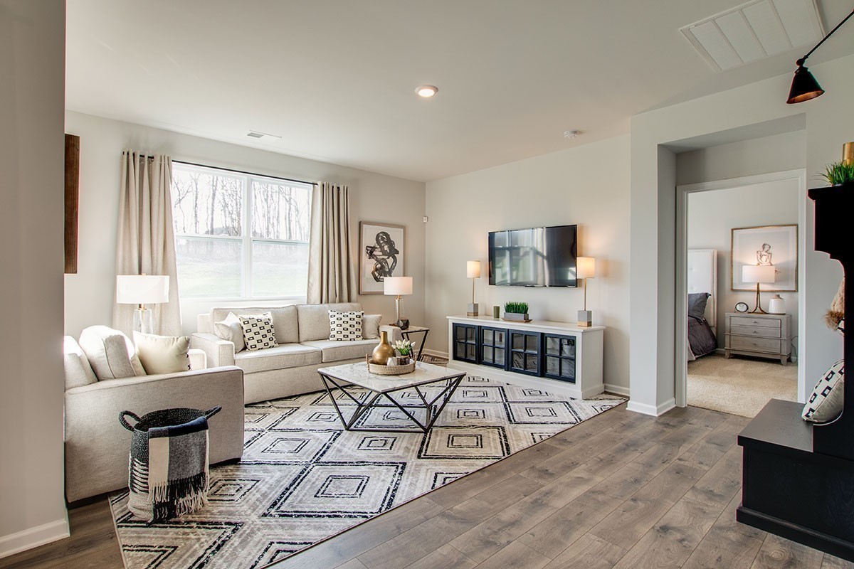 1225 Bufflehead Way Lebanon, TN 37090 - Photo 11 of 23 a living room with furniture and a flat screen tv