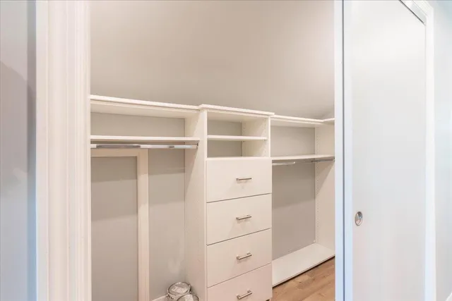 a view of an empty walk in closet