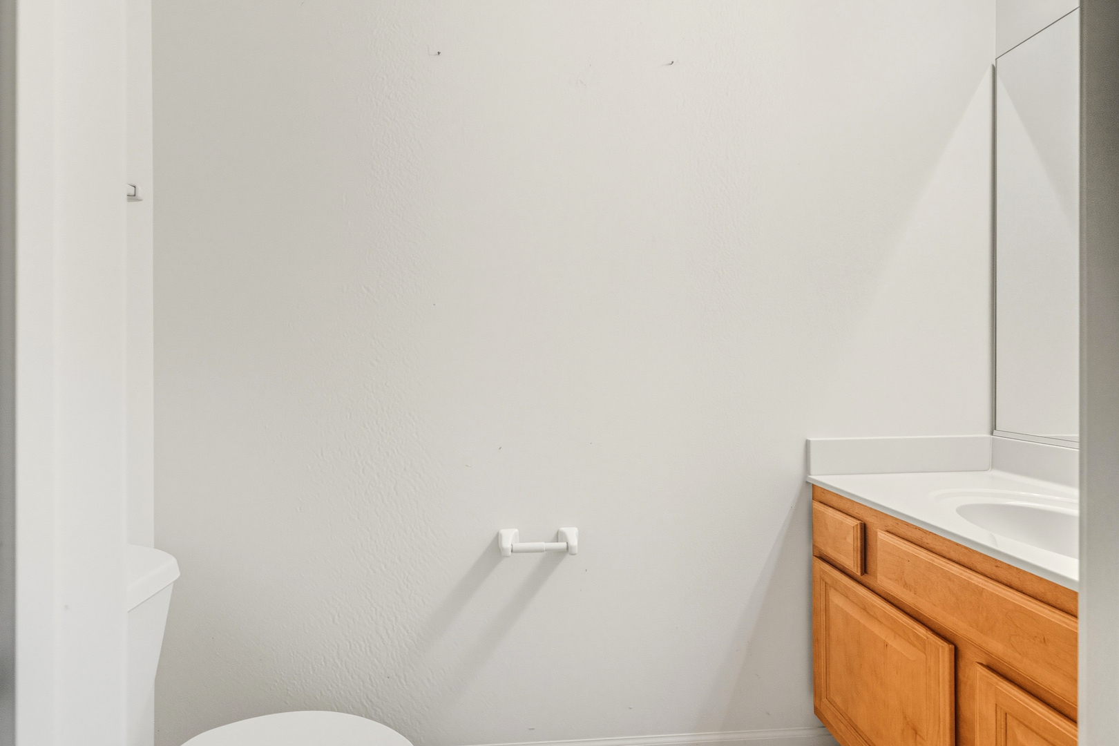 5662 Cambridge Way Hanover Park, IL 60133 - Photo 29 of 34 a bathroom with a sink and a toilet