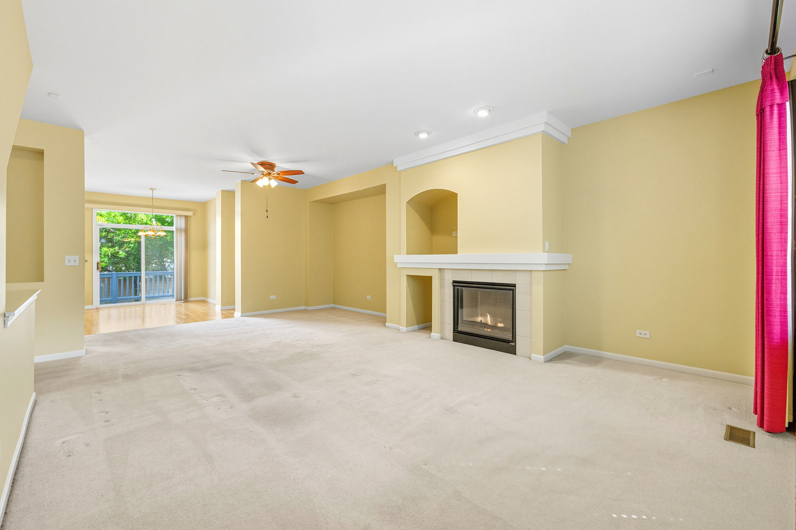 5662 Cambridge Way Hanover Park, IL 60133 - Photo 7 of 34 a view of an empty room with a fireplace