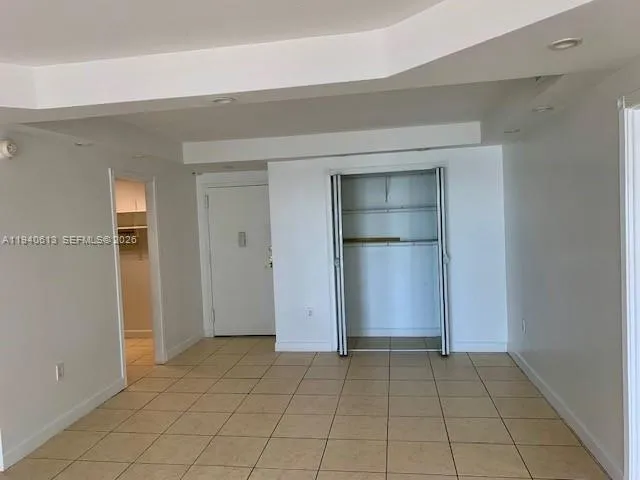 an empty room with closet