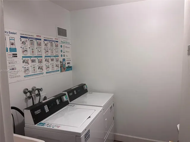 a kitchen with stainless steel appliances a refrigerator and a counter