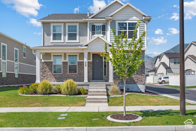 980 West 1275th Street South Springville, UT 84663 - Photo 1 of 1 Craftsman-style house with stone siding and stucco siding