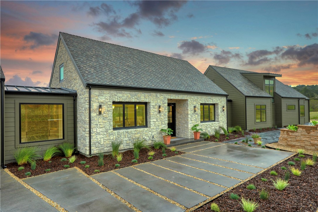 a front view of a house having patio