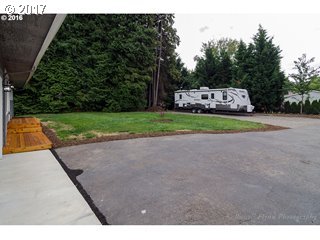 13240 Southeast Rusk Road Milwaukie, OR 97222 - Photo 22 of 24 a car parked on the side of the road